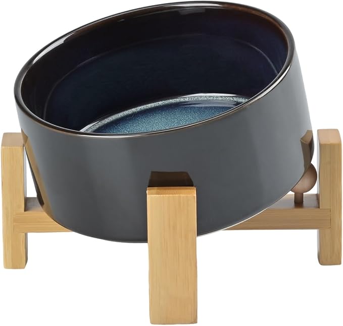 SPUNKYJUNKY 15° Slanted Ceramic Dog and Cat Bowl with Wooden Stand, Tilted Bulldog Food and Water Bowl No Slip Non-Spill for Cats Medium Dogs Big Face Pets 28.7 OZ (3.6 Cups, Starry Blue)